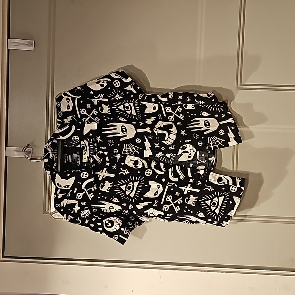 Spencer's, size small shirt, black and white, magical print.